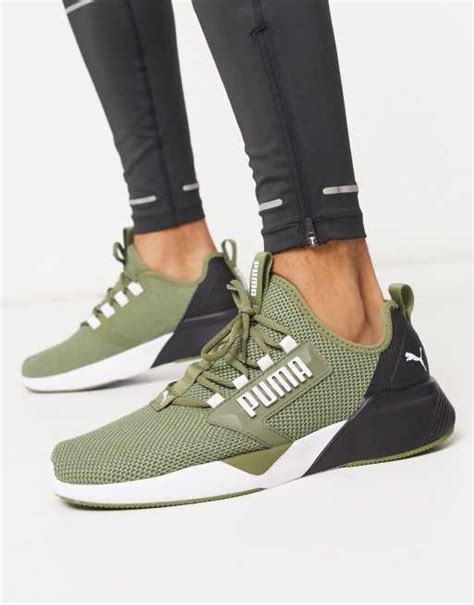 puma running retaliate trainers in khaki